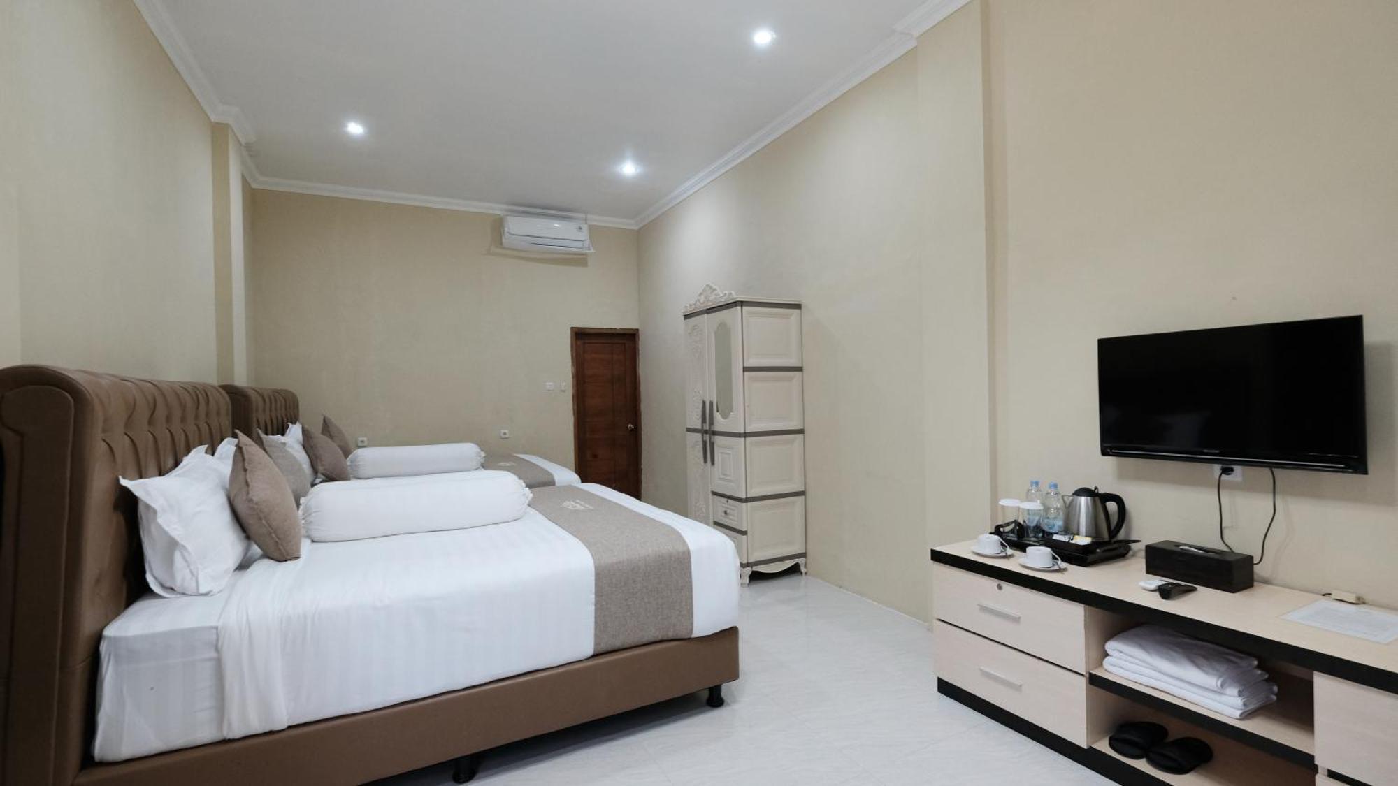 Bukit Indah Doda Hotel & Resorts Палу Номер фото