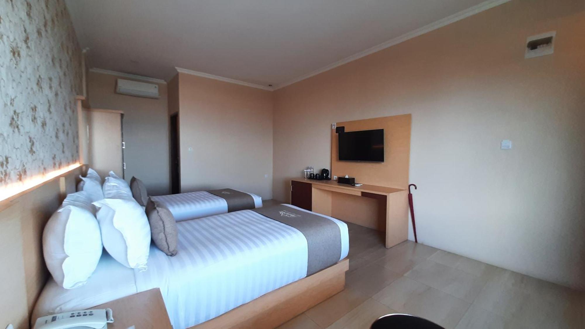 Bukit Indah Doda Hotel & Resorts Палу Номер фото